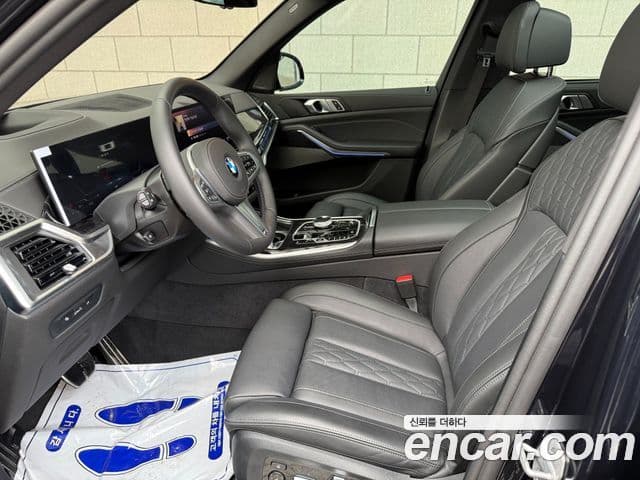 BMW X5 2025 — ფოტო 16/20
