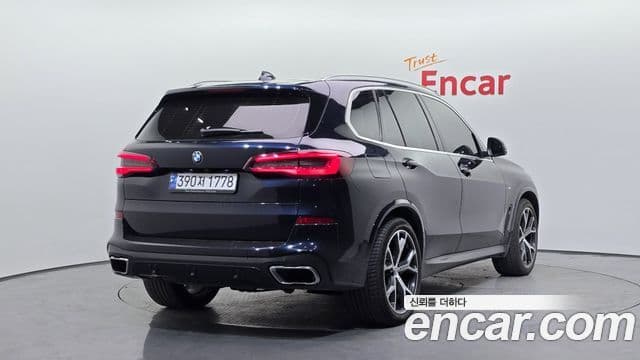 BMW X5 2022 — ფოტო 14/20