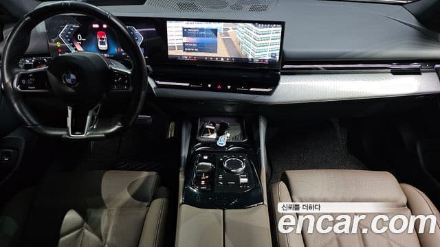 BMW 5 Series 2024 — ფოტო 7/20