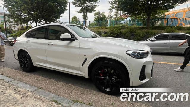 BMW X4 2021 — Фото 2/11