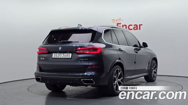 BMW X5 2022 — ფოტო 1/20