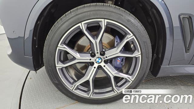 BMW X5 2022 — ფოტო 4/20