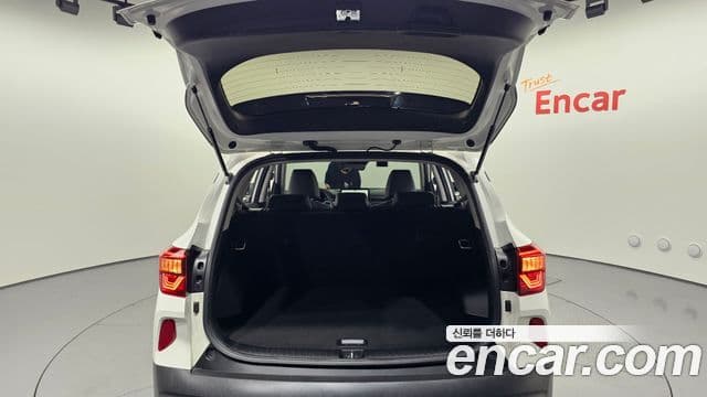 Kia Seltos 2021 — ფოტო 17/20