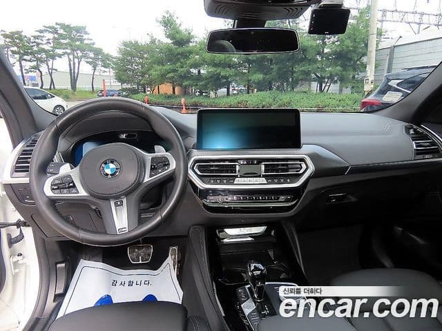 BMW X4 2024 — Фото 4/20