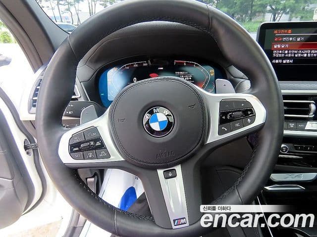 BMW X4 2024 — Фото 11/20