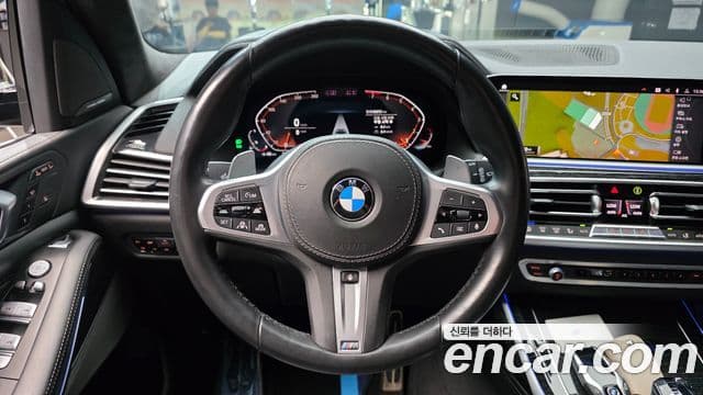 BMW X7 2021 — ფოტო 13/20