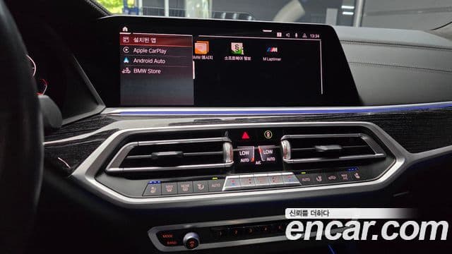 BMW X7 2021 — ფოტო 14/20