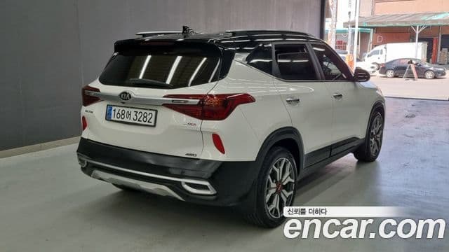 Kia Seltos 2019 — ფოტო 1/18