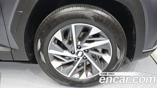 Hyundai Tucson Hybrid 2023 — Photo 9/34