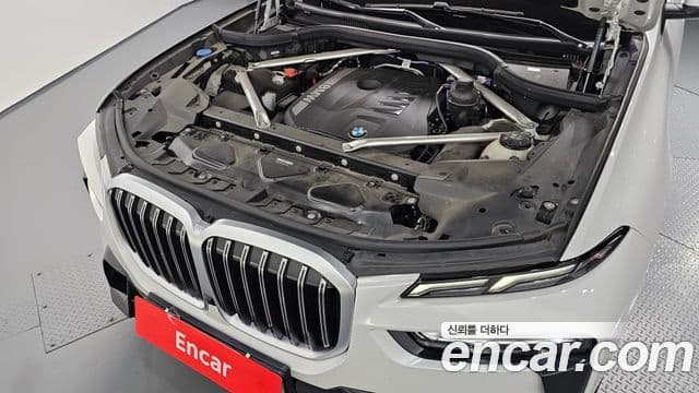 BMW X7 2023 — ფოტო 6/20