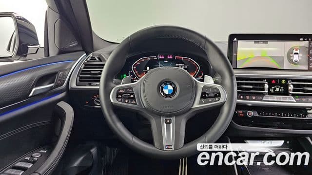 BMW X4 2025 — ფოტო 14/20