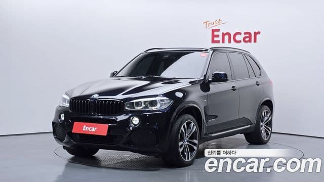 BMW X5 2018 — Фото 1/20