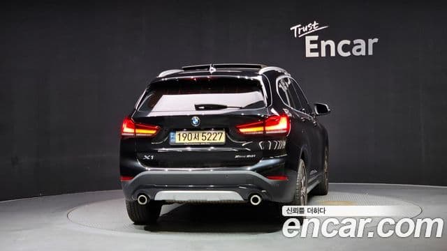 BMW X1 2021 — ფოტო 4/20