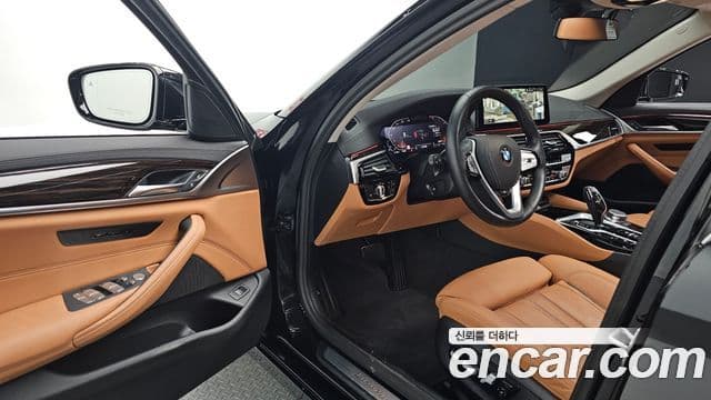 BMW 5 Series 2023 — ფოტო 10/20