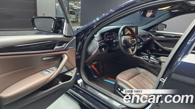 BMW 5 Series 2023 — ფოტო 10/20