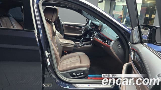 BMW 5 Series 2023 — ფოტო 12/20