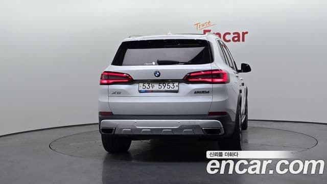 BMW X5 2019 — ფოტო 4/20