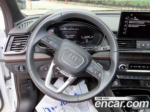 Audi Q5 2023 — Фото 7/20