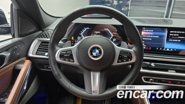 BMW X6 2023 — ფოტო 13/20