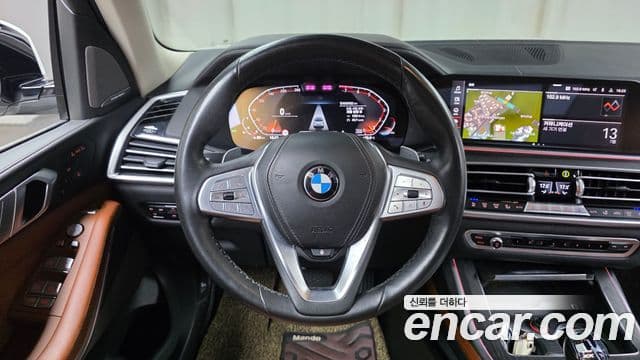 BMW X7 2021 — ფოტო 15/20