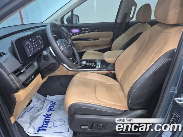 Kia Carnival 2023 — фото 10 из 19