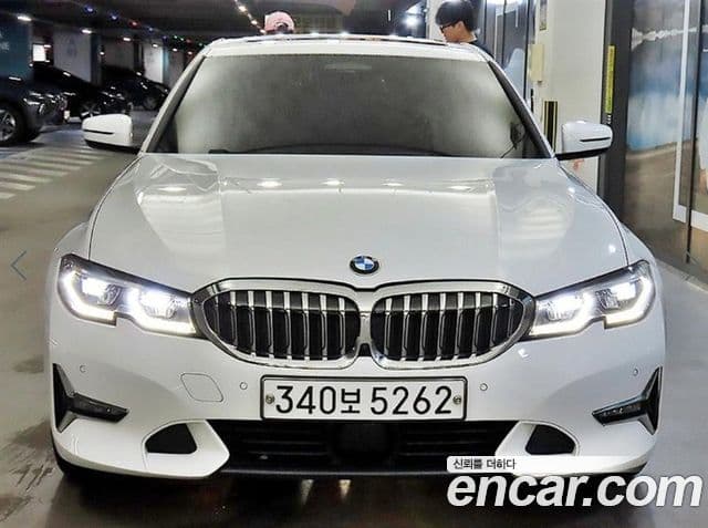 BMW 3 Series 2019 — ფოტო 1/20
