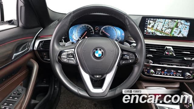 BMW 5 Series 2018 — Фото 12/20