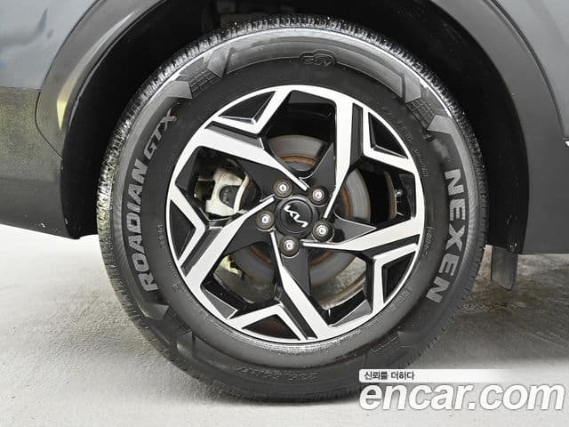 Kia Sportage 2023 — ფოტო 4/20