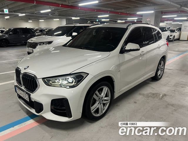 BMW X1 2019 — ფოტო 1/20
