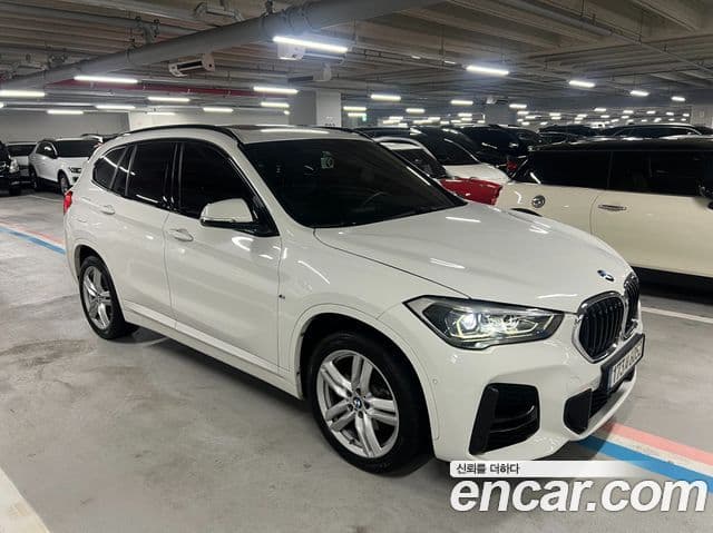 BMW X1 2019 — ფოტო 7/20