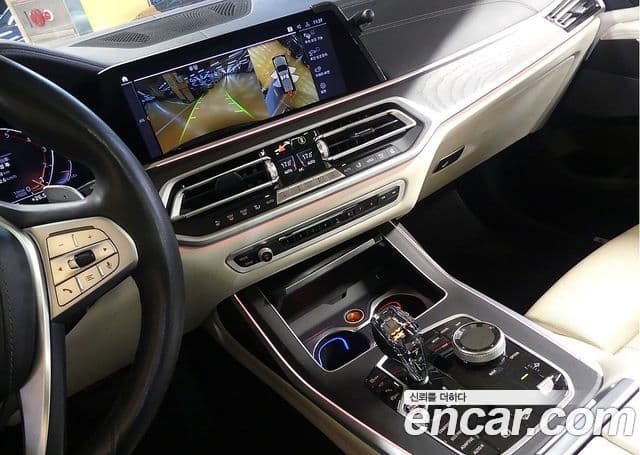 BMW X7 2022 — ფოტო 14/20