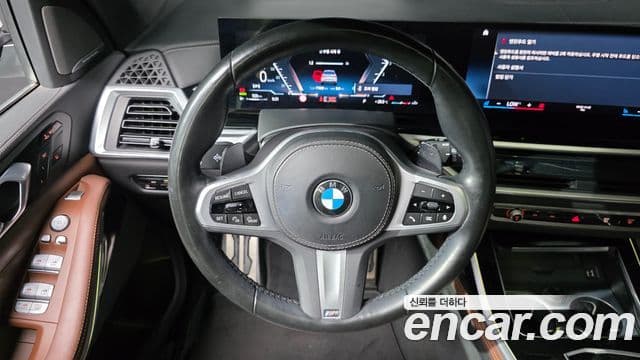 BMW X7 2023 — Фото 12/20