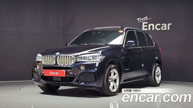 BMW X5 2018 — Фото 1/20