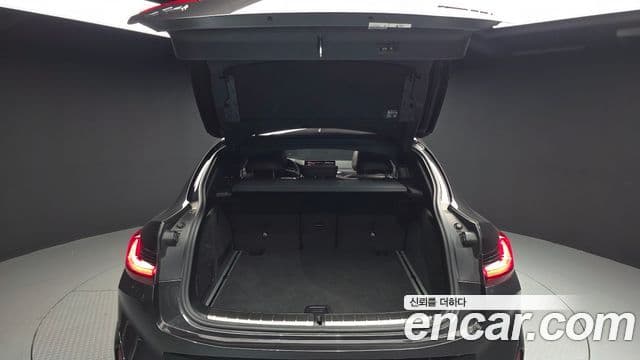 BMW X4 2023 — Photo 16/32