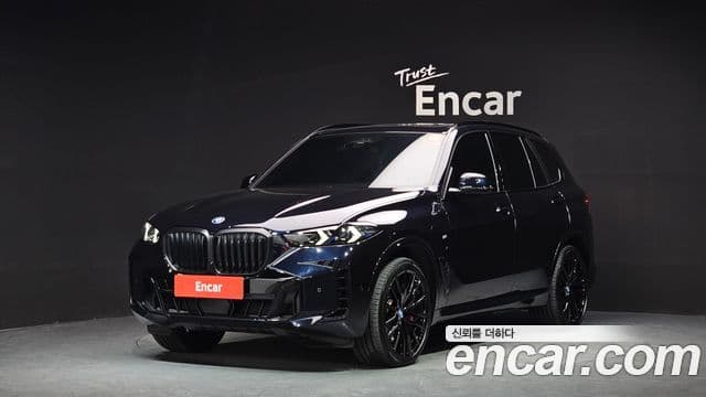 BMW X5 2023 — Фото 1/20