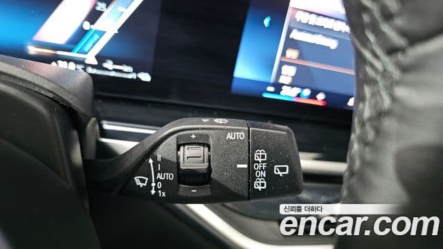 BMW X5 2023 — ფოტო 27/32
