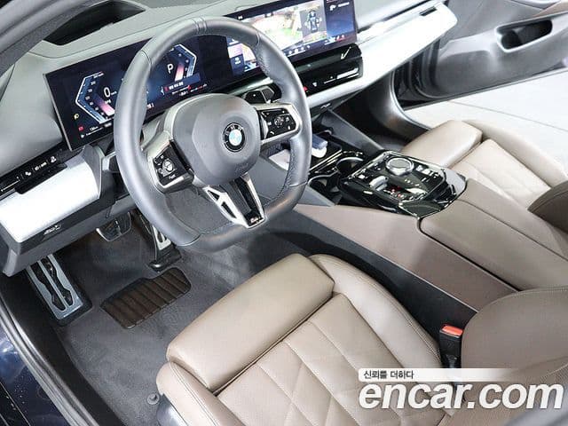 BMW 5 Series 2023 — Фото 10/20