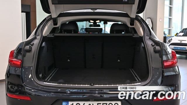 BMW X4 2022 — ფოტო 13/20