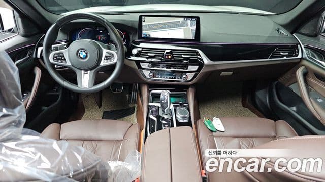 BMW 5 Series 2023 — Фото 7/20