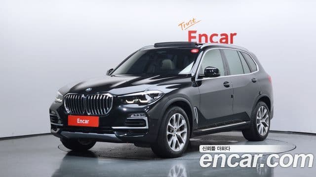 BMW X5 2019 — Фото 1/20