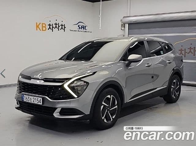 Kia Sportage 2023 — Фото 1/18