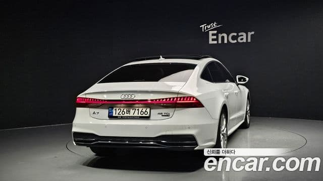 Audi A7 2021 — ფოტო 4/20