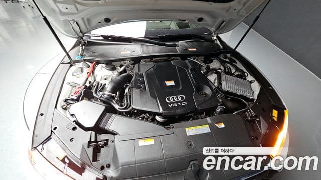 Audi A7 2021 — ფოტო 6/20