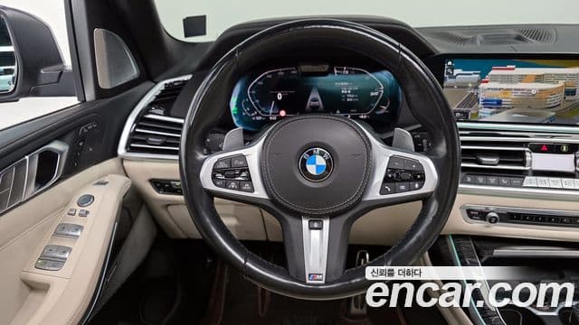 BMW X7 2021 — ფოტო 13/20