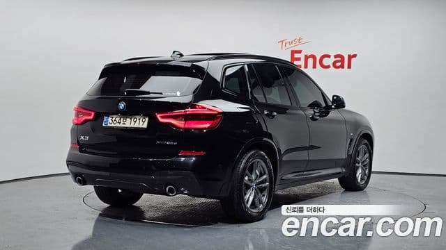 BMW X3 2021 — Фото 2/20