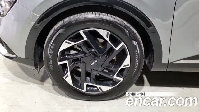 Kia Sportage 2021 — ფოტო 4/16