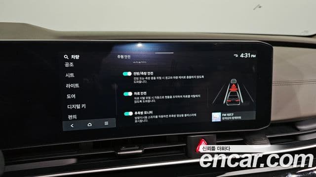 Kia Carnival 2023 — ფოტო 16/20