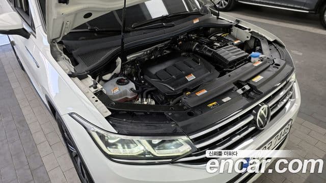 Volkswagen Tiguan 2022 — ფოტო 6/20