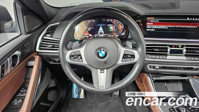 BMW X6 2023 — ფოტო 13/20
