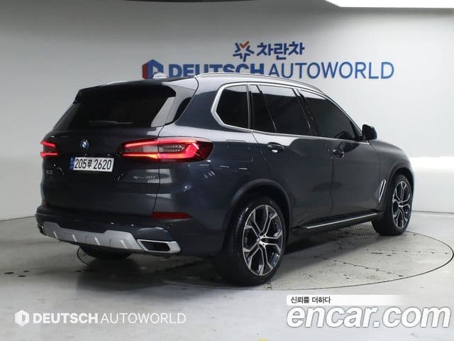 BMW X5 2022 — ფოტო 1/20